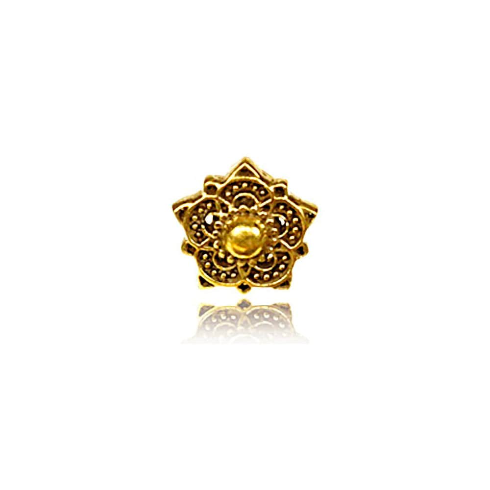 The Zenaya Brass Ear Stud by Kaya Movement is a beautifully designed earring featuring a six-petal lotus flower with intricate filigree detailing and a small raised dome at the center, reminiscent of elegant mandala designs. Its shiny, reflective surface stands out beautifully against a white background. Designed to evoke a sense of boho and slow life, this small earring perfectly captures the essence of tranquil elegance.